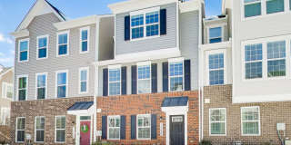Welcome to this beautifully designed 3 level townhome in Westphalia Town Center Community! Gallery 35