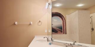 Experience Bell Tower Park. GATED ground floor 2 Bed 2 Bath Den 1 Car Garage Condo. Gallery 26