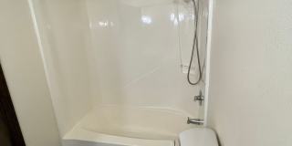 Beautiful One-Level Home with Sunroom, Vaulted Ceilings & Multiple Living Areas Gallery 28