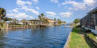 Beautiful canal front home with dock! Gallery 3