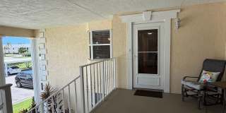Furnished 2 BR , 2 Bath condo - with Heated Pool and Security Gate Gallery 3