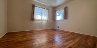Bi-Level House w/ Massive Backyard, Storage, & Character! Gallery 13