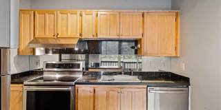$500 off! Spacious 1-bdrm/1-bath condo in quiet neighborhood. Balcony, 2 parking spaces, fireplace, hot tub, & pool Gallery 23