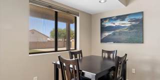 Furnished Basement home ready for move in NOW!!!  Corner lot, No HOA, lots of parking!!!  RV gates!!!  Luxurious backyard with pool and is your own Oasis in the City just out of the City!!!  Close to Lake Pleasant!!! Gallery 14