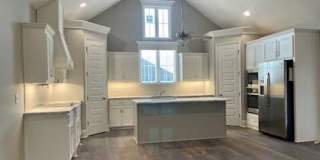 Elegant 4-Bedroom Home with Modern Upgrades, Fenced Yard, and Outdoor Living Gallery 1