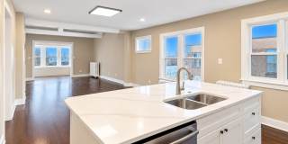 STUNNING RENOVATED 4 BEDROOM DUPLEX ON GRAND AVE – MOVE-IN SPECIALS! Gallery 1