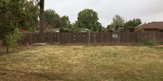 Spacious 4-Bedroom Home with Large Fenced Yard & Covered Patio Gallery 17