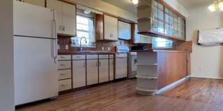 Bi-Level House w/ Massive Backyard, Storage, & Character! Gallery 10