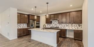 Beautiful two-story home with a walk-out finished basement is for the perfect family home Gallery 10