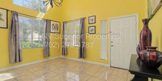 NW!! 4 Bedrooms!!! All Tile and Pergo flooring T/O!! NO Carpet!!! Low Maintenance Desert landscaping front and back!! With Patio cover in back!!! Gallery 6