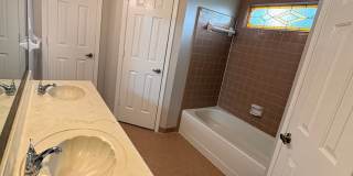 Spacious Home Freshly Painted and New Carpeted! Fully Fenced in Back Yard. Gallery 13