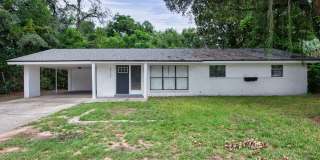 Beautifully Updated Home with a Versatile Florida Room & Spacious Backyard Gallery 1