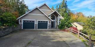 *NEW YEAR SPECIAL! 1/2 OFF FIRST MONTH OF RENT!* Bright and Stunning 2-Story Home with Daylight Basement – 3,000+ Sq Ft! Gallery 1