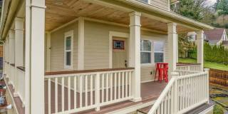 Beautifully updated, furnished home with wrap around porch and Columbia River Views! Gallery 1