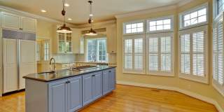 Stunning two-story spacious home on tranquil tree-lined street. Gallery 27