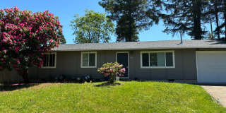 Three Bedroom Home with a garage in Lincoln City! Gallery 1