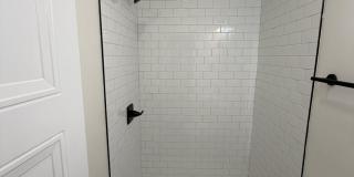 Rare 2-Full Bath Find: Pristine Renovation with Designer En-Suite & Granite Gallery 10