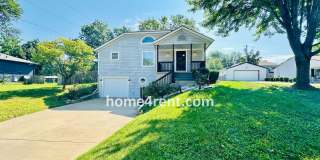 Overland Park Raised Ranch, Primary Suite on the Main Level, Updated Kitchen and Fenced Yard! Gallery 1