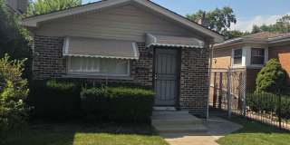 Spacious 5-Bedroom Raised Brick Ranch with Fenced Backyard Gallery 1