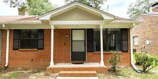 COZY 2/2 SE Townhome with Plank Floors, W/D, Stainless Steel Appliances, Carport, & W/D! Avail NOW for $1495 Gallery 1