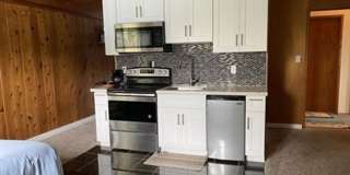 Small Studio Condo, Partially Furnished, Located in Town! Gallery 1