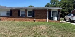 Adorable Duplex with New Flooring! - Lawncare Included! Adorable Duplex with New Flooring! - Lawncare Included! Gallery 1