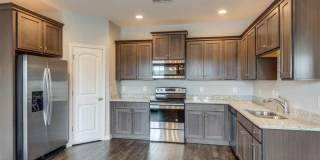 Fairview Station Charmer!  Perfectly comfortable 4/2.5 family home close to Westwood Elementary. Gallery 8