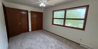 August 15th rent special! New deck! 3 Bedroom, updated kitchen, updated flooring, garage, driveway, and fenced yard - 9 month lease available! Gallery 7