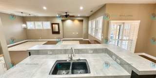 Open Kitchen, Expansive Living, and Covered Patio in Tranquil South Reno Near Trails, Parks & Shopping Gallery 9