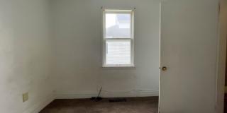 Fall into this cozy 3-Bedroom Home with a fenced in yard & detached garage! Gallery 9