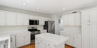 This exceptional home offers the perfect blend of timeless design, generous living space, and an unbeatable location in the heart of Lyon Park. Gallery 14