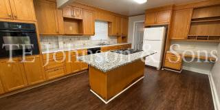 Spacious One Level Home with Den, Granite Kitchen Island, and 2 Car Carport Gallery 18