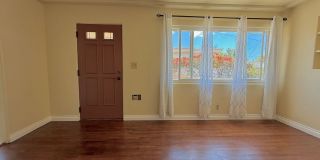 Cozy Two Bedroom Duplex w/ Hardwood Floors! Lovely Kitchen! Lots of Natural Light! Gallery 7