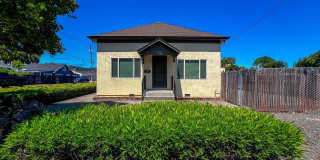 Charming 2 Bedroom, 1 Bathroom Home with Large Fenced Yard + Garage Charming 2 Bedroom, 1 Bathroom Home with Large Fenced Yard + Garage Gallery 1