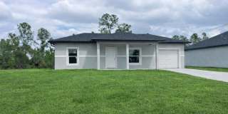 NEW CONSTRUCTION- Modern 1 Bd / 1Ba / 1g Home in Lehigh Acres Gallery 1