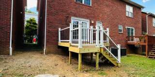 2 bed, 2.5 bath updated townhouse w/ 1-car garage & Trex deck available now Gallery 26