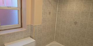5BR/1.5BA Row Home with Backyard and Laundry Hookups Gallery 23