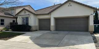 4 bedroom home with 3 car garage in Patterson! Gallery 1