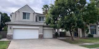 Spacious Elk Grove Home with fresh paint, laminate flooring and close to schools and parks. Gallery 1