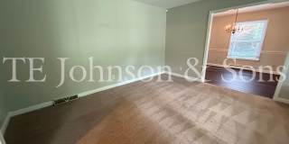 Spacious One Level Home with Den, Granite Kitchen Island, and 2 Car Carport Gallery 6