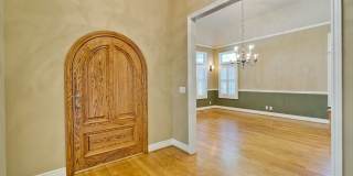 Stunning two-story spacious home on tranquil tree-lined street. Gallery 9