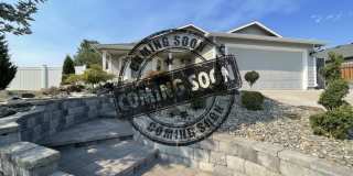 3 Bed, 2 Bath Home with a Two-Car Garage, Fenced Backyard, and Lawn Care Included Gallery 1