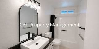 Spacious 4-Bedroom Home with 2-Car Garage & Backyard Oasis Gallery 1