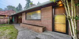 Ideally Located 3 Bed 1 Bath Burien Home w/ Huge Fenced Yard & Garage! Ideally Located 3 Bed 1 Bath Burien Home w/ Huge Fenced Yard & Garage! Gallery 1