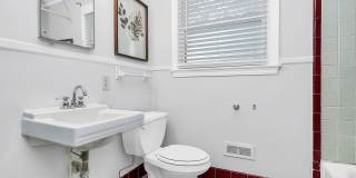 Discover the charm of this brick ranch nestled in the heart of Madison Park Gallery 27