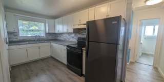 Cute and Cozy, Centrally Located Triplex with Yard Gallery 1