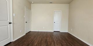 Wood Like Tile Flooring & Vinyl Plank - No Carpet / 1 Story Unit/ Fenced in Yard / Interior Washer Dryer Connections / CISD Gallery 15