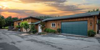 2 bedroom 2 bath with one car garage on a gated property surrounded by vineyard views Water and Sewer paid for! Gallery 1