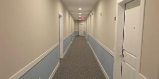 Beautiful 2nd floor (with elevator services) condominium: 2-bed, 2-bath, beautiful kitchen, bonus room, laundry room & deck! Gallery 5