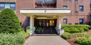 Top-Floor 1BR Condo with NYC Skyline Views, Parking & Walkable Rutherford Location Gallery 1